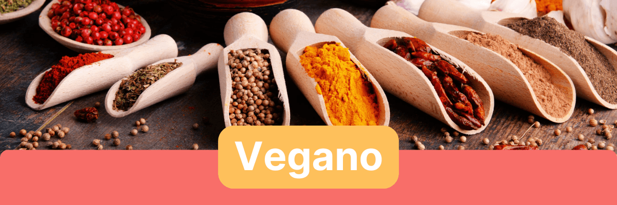 Spices in wooden spoons for vegan food